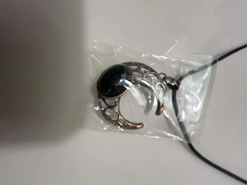 Vintage Hollow Crescent Moon Pendant with Black Stone on Black Cord